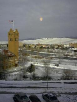 Milwaukee Depot ~  December 14th and a sub-zero day with the Hellgate winds howling through downtown Missoula, Montana. Taken through a window with a cellphone (sorry, too cold); the light in the sky is the reflection of a lightbulb.  
