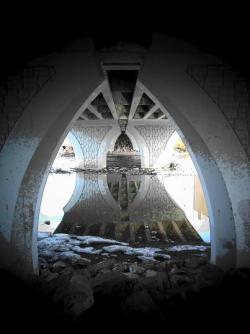 Under the Orange Street bridge ~  Missoula, Montana on a low-water day in March 2010. (Spotlit, cartooned) These arches remind me of a cathedral. They are only noticeable when stopping along the foot path that follows the Clark Fork River. 