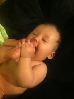 May 13, 2013 ~  This month Rosalie discovered her feet and realized she could also lick them!  