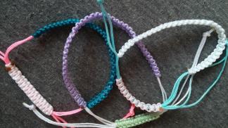 All three bracelets together ~ They all have white, I noticed. *Pthb*