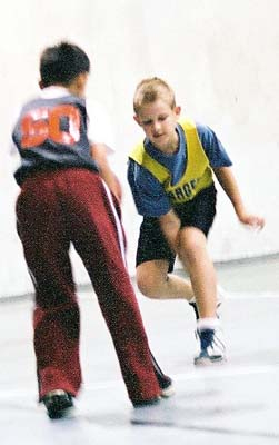 Colby knocks the ball out of the opponent's hand