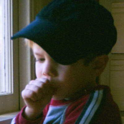 My thumb-sucker son, Jonah, in his baseball cap.