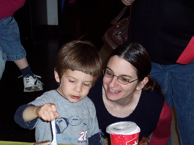 Here's Jonah happily eating cake at a birthday party for my cousin's son.