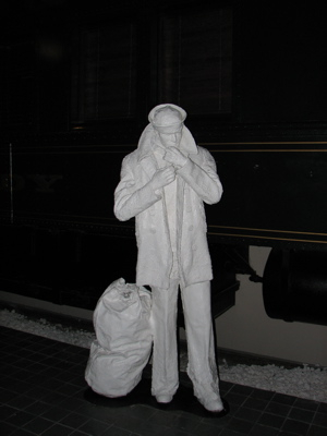 A statue of a typical traveler in the Union Central Station