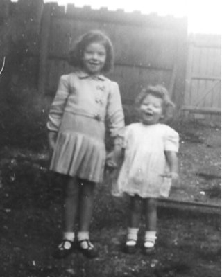 Holding Hands my sister Betty and I.