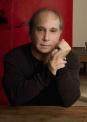 Paul Simon is almost lacking earlobes, if you look closely.