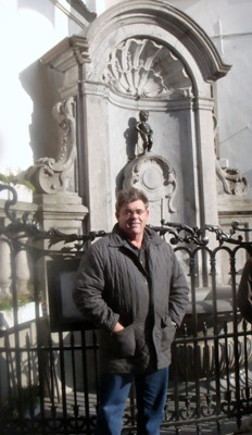 Charles with Mannekin Pis statue in Brussels