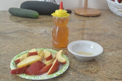 My aunt and uncle own an apiary and gave us honey. I cut some apples and so good!