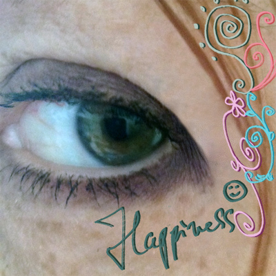 A picture of my eye, all dolled up with Photoshop squiggles!