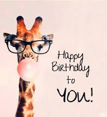 a happy birthday giraffe, blowing bubbles