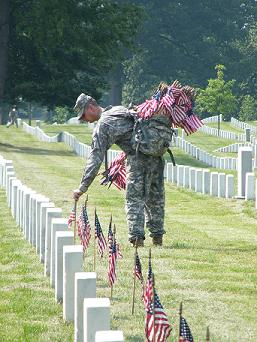Placing flags at Arlington in preparation for Memorial Day