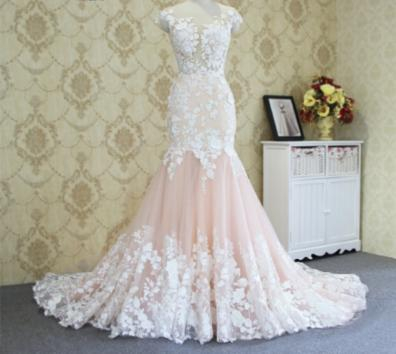 Soft peach gown with handcrafted lace