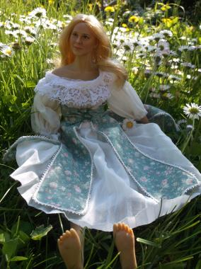 My fairy princess doll sitting amongst the daisies