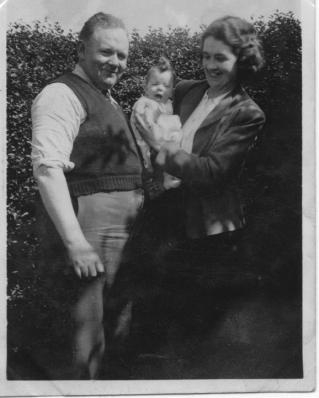 A photo of my Mum and Dad with me when I was a baby