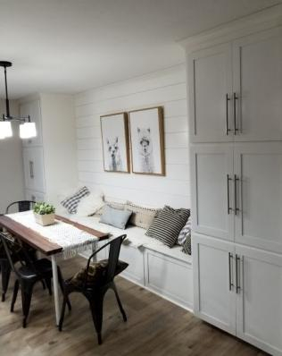 Dining area and storage cabinetry.