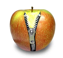 An apple with a zipper.