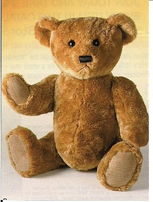 Cute old fashioned Teddy Bear in museum. 