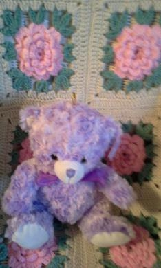 Cute lavender teddy bear I got for Mothers Day. I named him Prince for the Rock Singer.