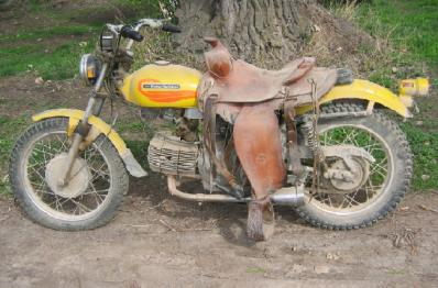 Dad's Harley Sprint outfitted with his western saddle 