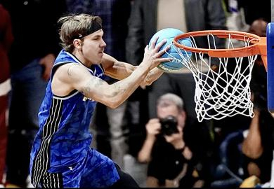 My era of dunking a basketball, no cars parked in gym. Though, I did jump over car hoods.