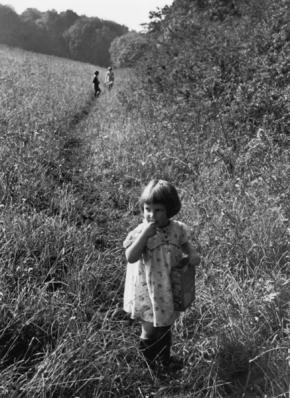 Kids hanging out in the countryside.