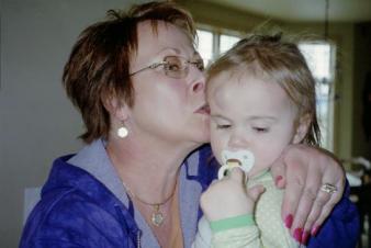 Big Bonk ~ Kera fell on Easter Sunday at my parent's home. She immediately got a goose egg the size of kansas. Poor thing. Here's my mom trying to console her...