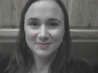 Me in my kitchen, courtesy of my camera phone! lol ~  No description included. 