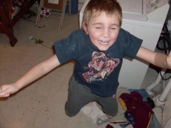 Tyler Feb. 2008 ~  Taken in the middle of a jump. I can never get him to sit or stand still for a picture. He is crazy! Age 6 