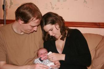 The proud parents, Mathew and Lisa with baby Henry ~  No description included. 