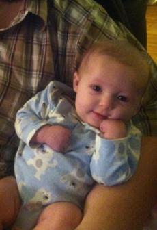 11-11-2012 ~  Posing in her Daddy's arm. She's such a ham! 