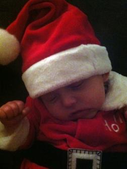 11-28-2012 ~  Rosalie practicing to be Santa. She feel promptly asleep, of course! 
