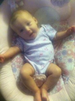 02-01-2013 ~  Rosalie talking with her Mommy. She's getting so long! Almost too long for Ye Faithful Bouncer... 