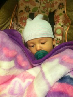 01-12-2103 ~  Bundled up in her car seat and ready to visit Grandma! 