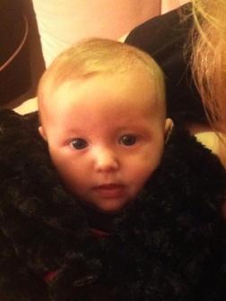 February 9, 2013 ~  Rosalie enjoying dress-up with her aunt, fur shawl and all. 