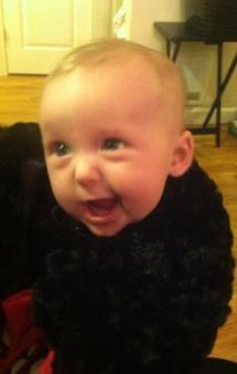 February 9, 2013 ~  Being amused by her cousin Emily. 