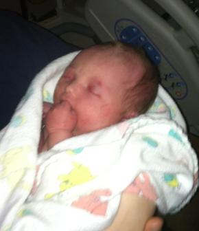 10-22-2012 ~  Being held by a friend the day she was born. 