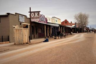 Tombstone ~ Though there is a state highway one block to the left in this photo, you'd never know it if you hadn't driven on it to get here.  Most of the 'downtown' area of Tombstone is segmented off, cars are not allowed on the dirt roads.  The OK Corral is just to the left in this photo, less than 100 yards away.  The 'Outhouse' in the photo is actually a ticket office for the Butterfield Stage Lines Ticket Office...